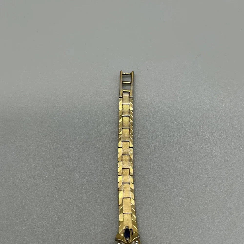 Geneva Womens Watch 16mm Champagne Dial Gold Tone Gemmed Blue Stones FOR PARTS